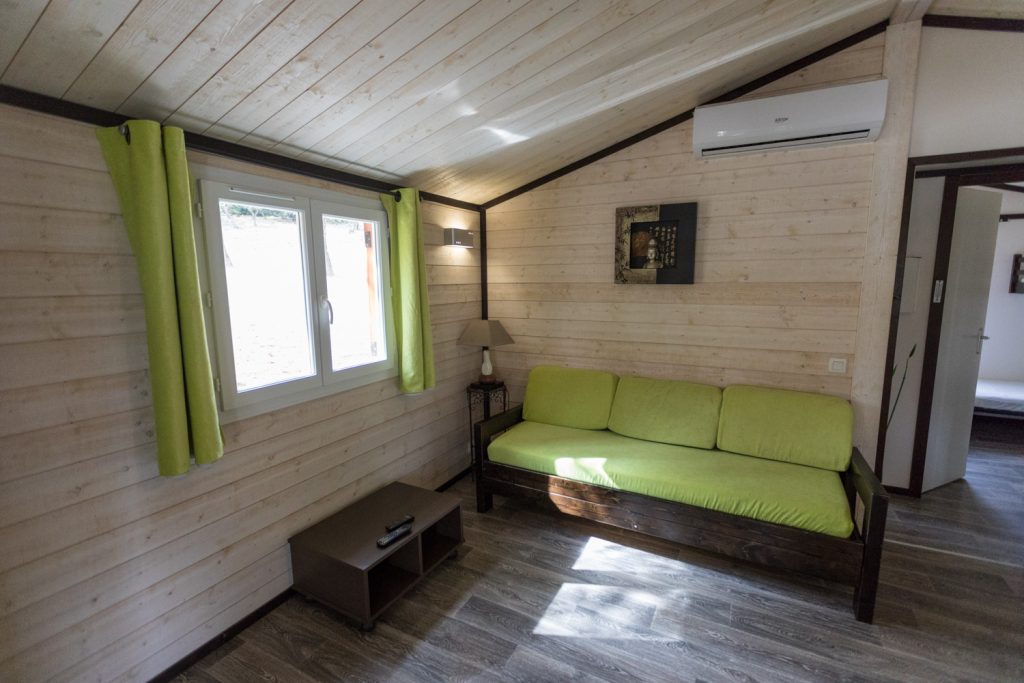 Wooden chalet Belle Vue at Mas Saint Antoine — chalet for 6 with covered terrace and comfortable living room, for family holidays in Ardèche